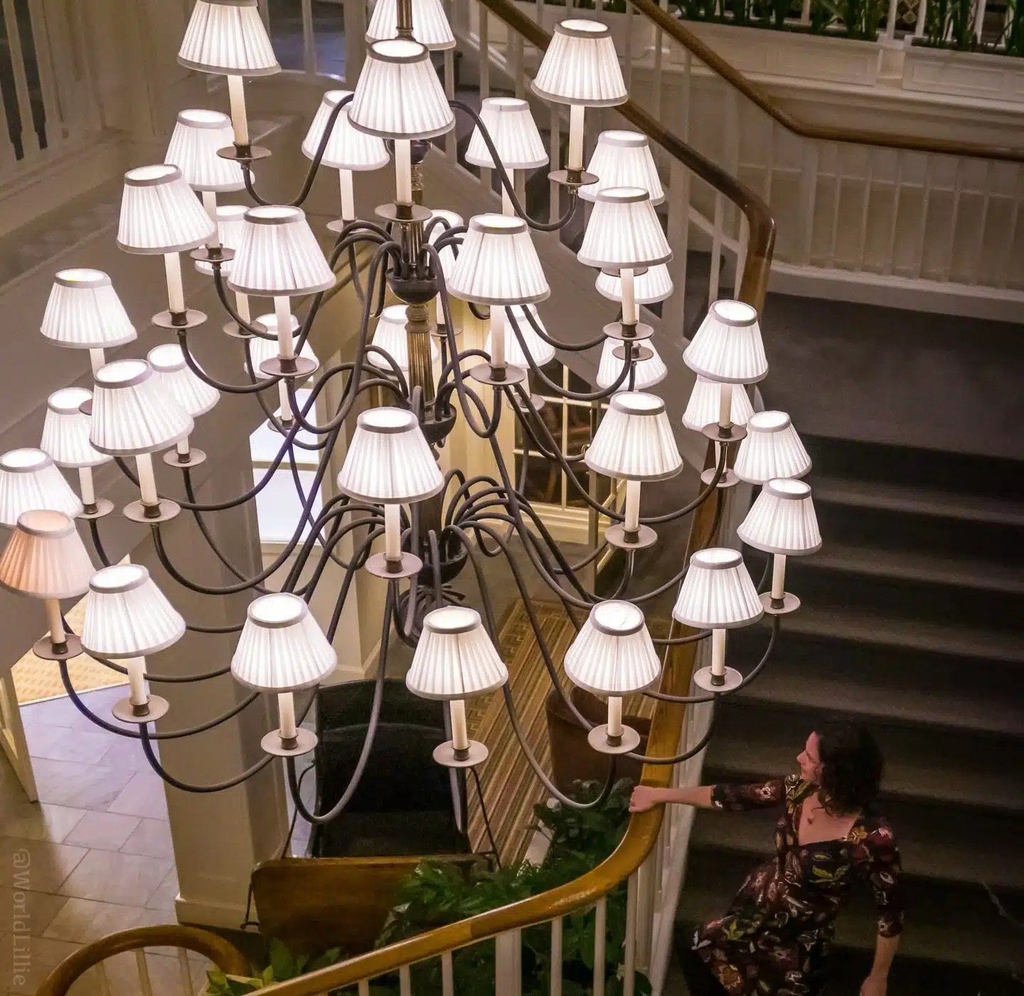 The grand chandelier and staircase of the Woodstock Inn.