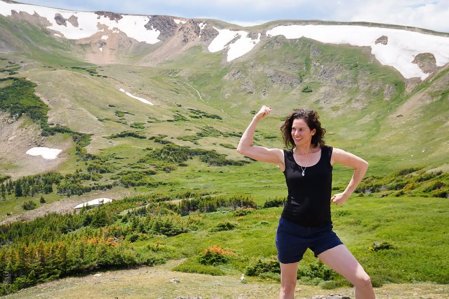 Flexing bicep muscles in Colorado Mountains: RMNP