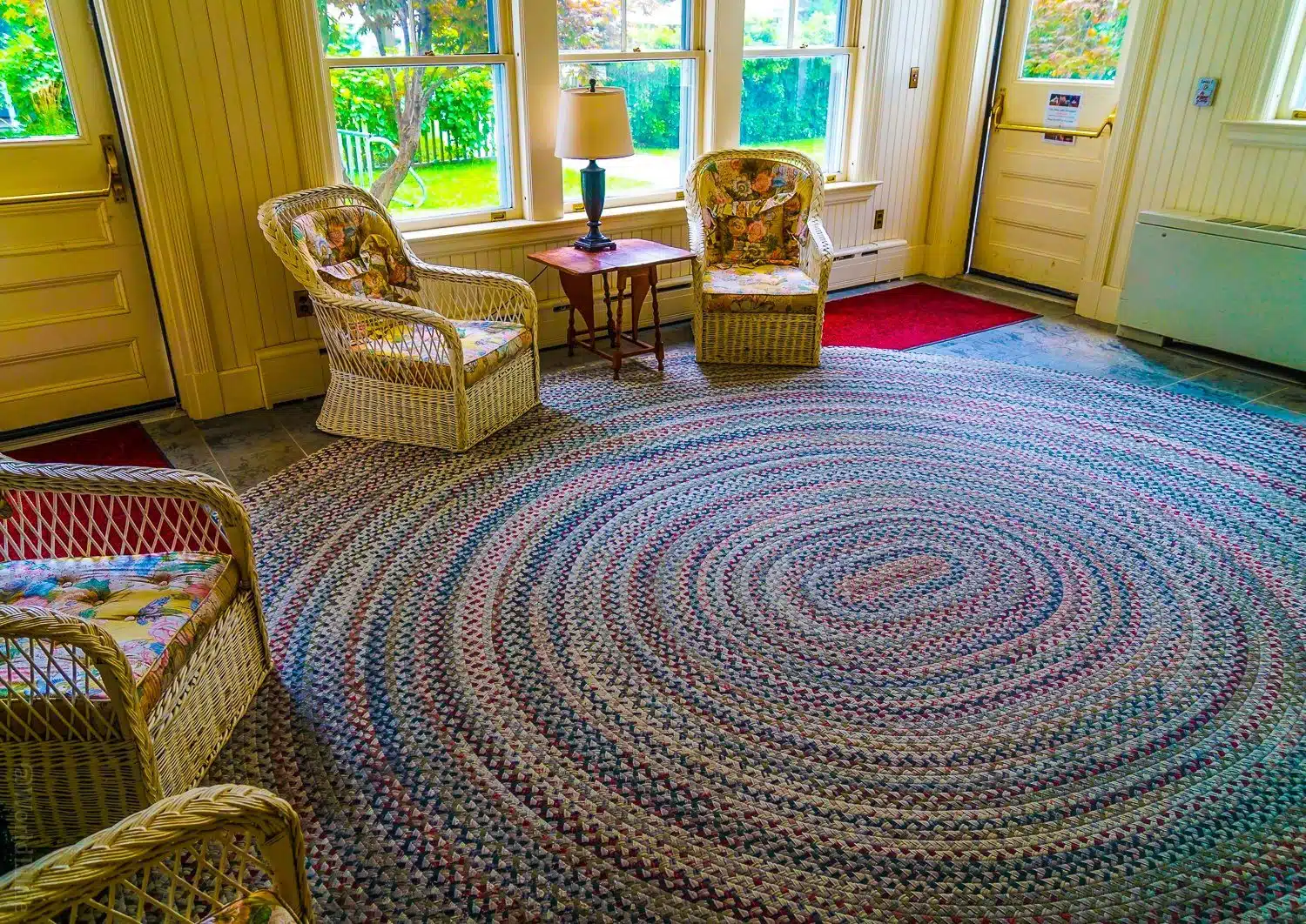 Giant circular braided coil rug in Red Lion Inn entryway, Stockbridge, Massachusetts.