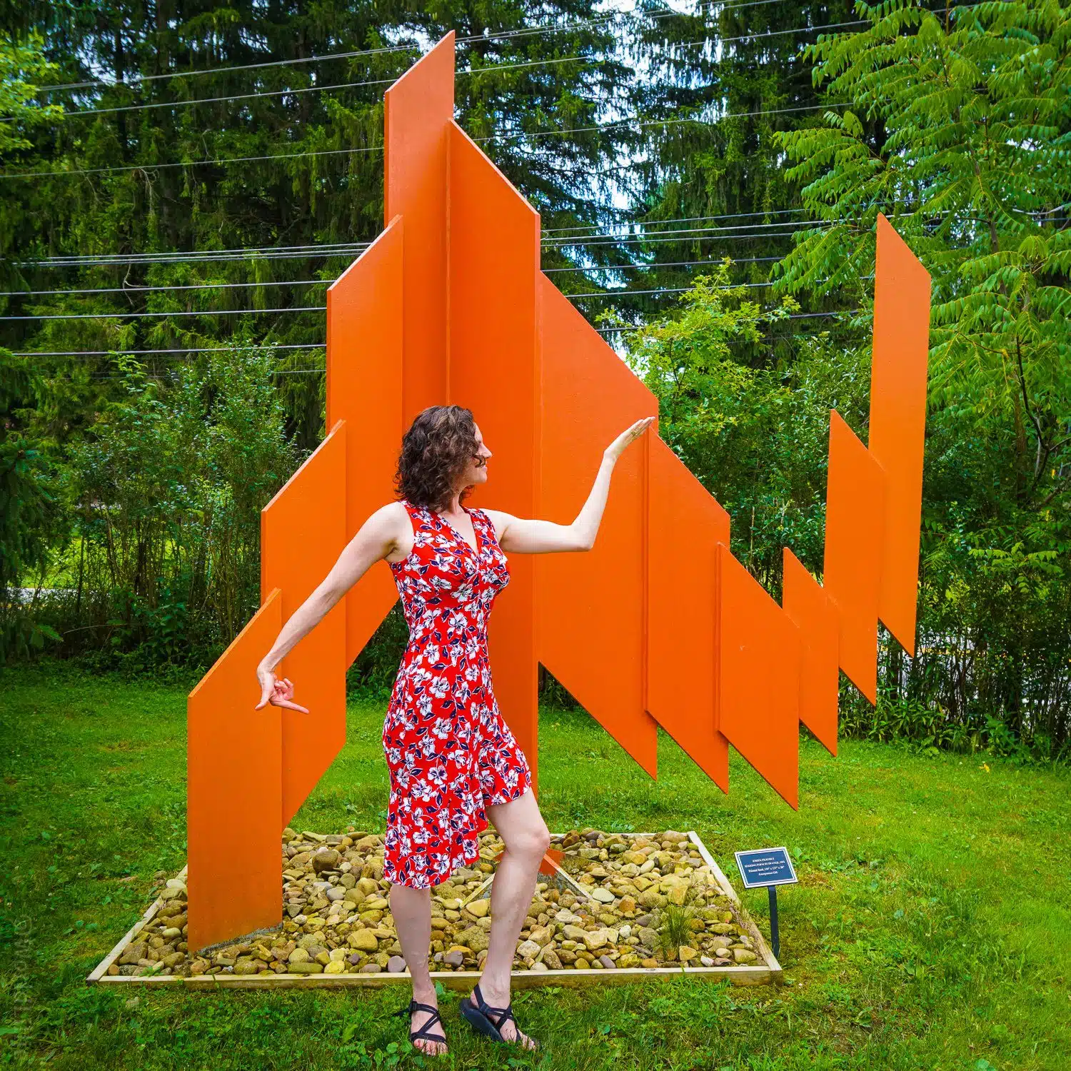 Orange sculpture matching pose