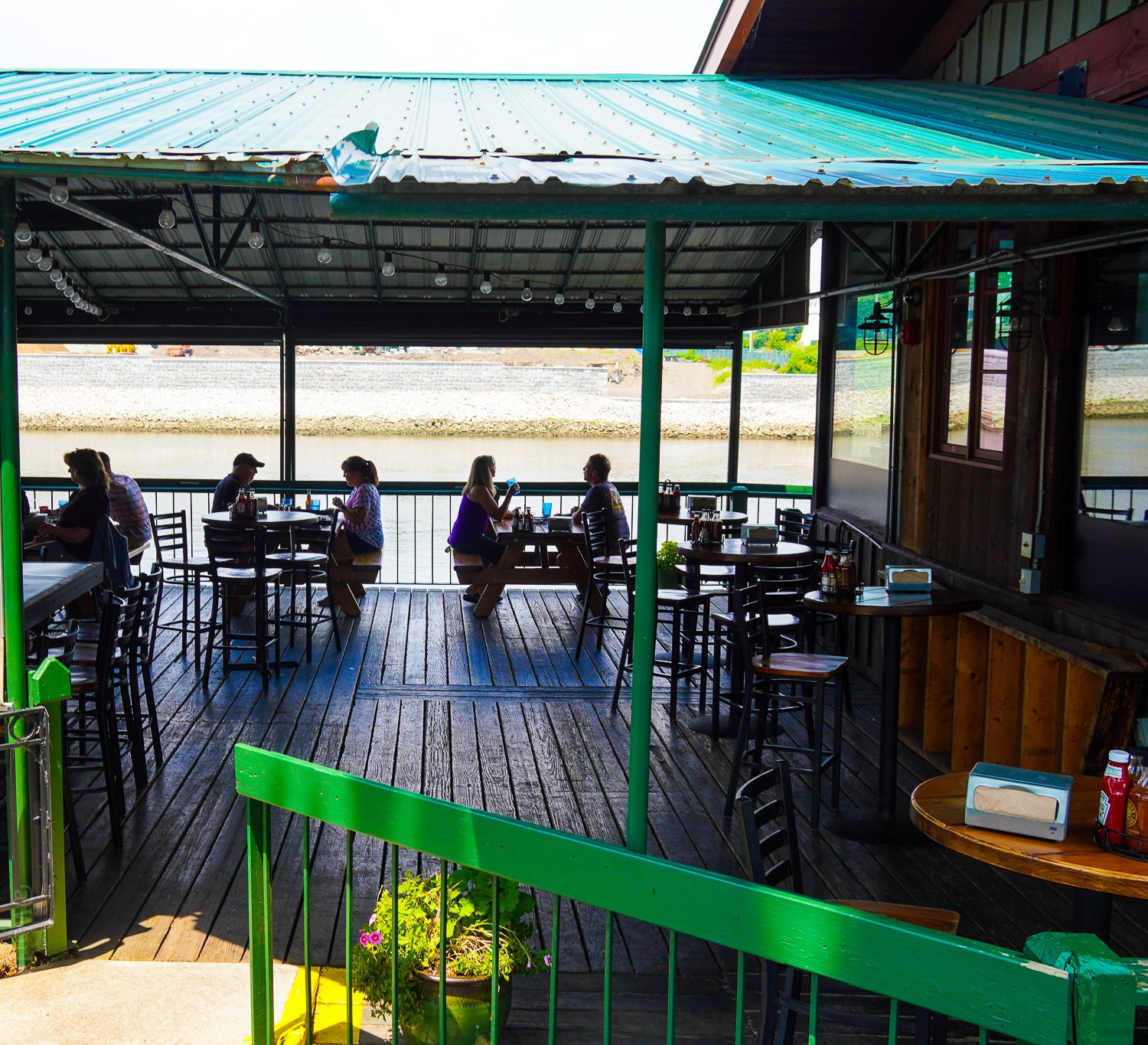 The outdoor riverside patio in Troy.