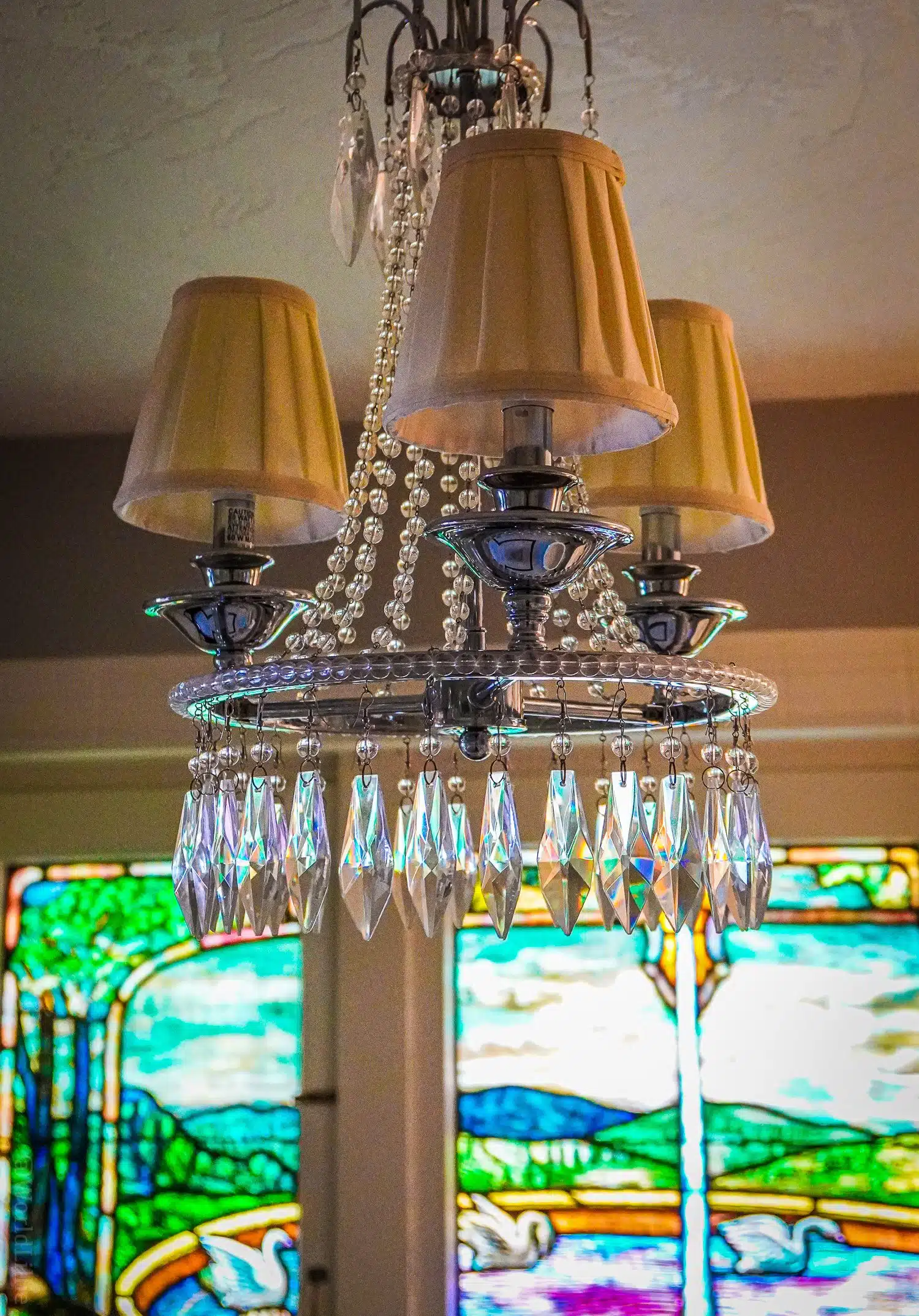 Stained glass and chandelier... in our hotel bathroom!