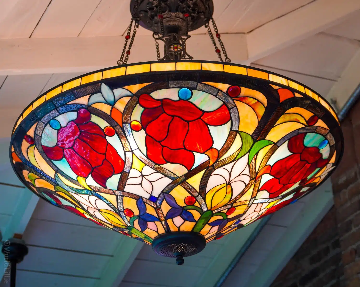 A close-up of the stained glass chandelier at Myriam's Table.
