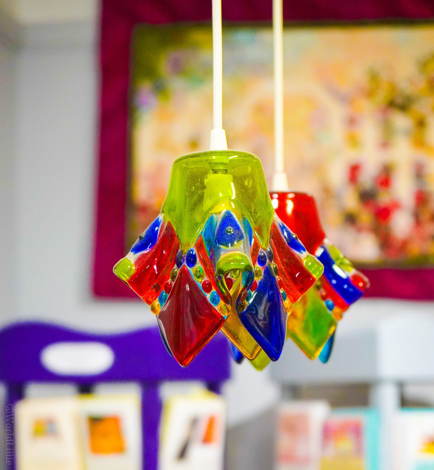 A tiny chandelier from folded rainbow glass.