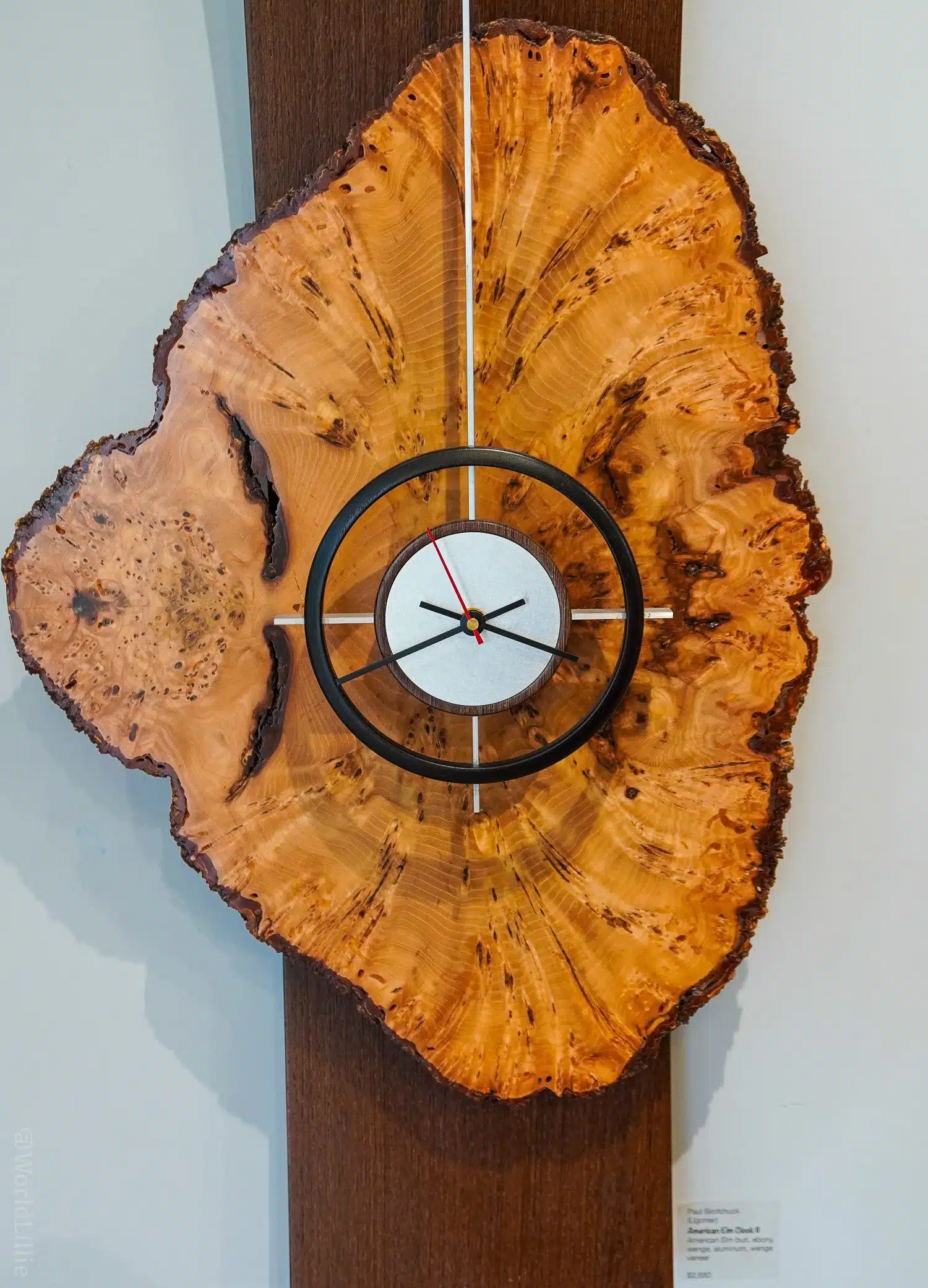 A clock by Paul Sirofchuck using the natural shape of the wood.