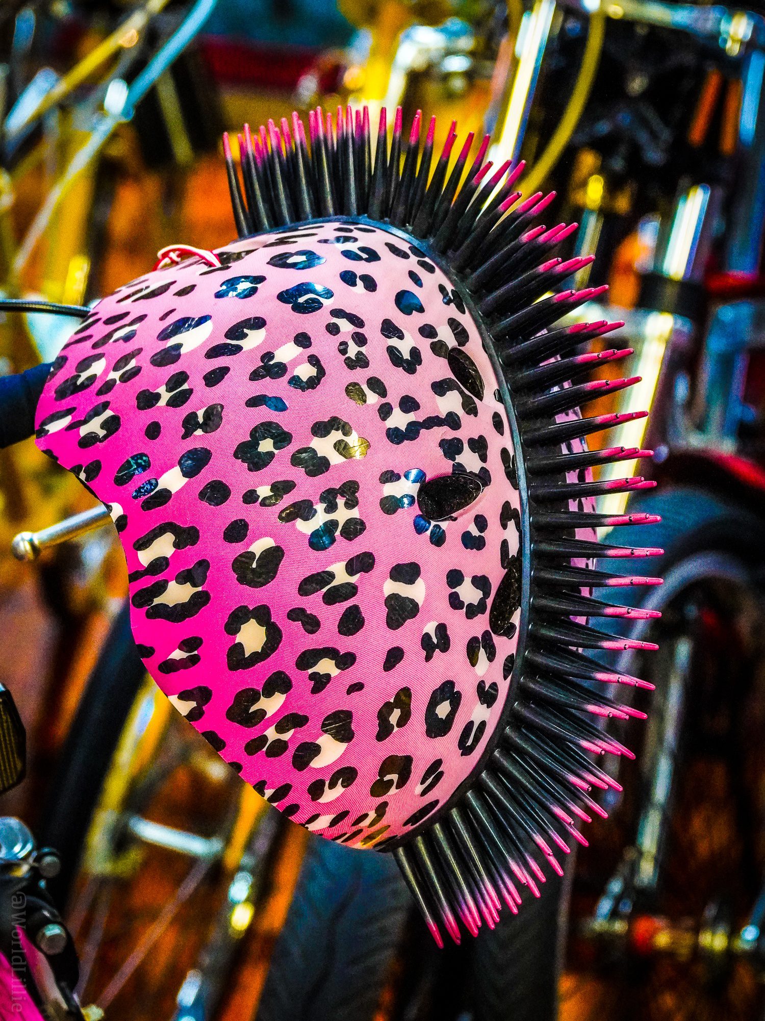 Spiky pink leopard print bike helmet for the win.