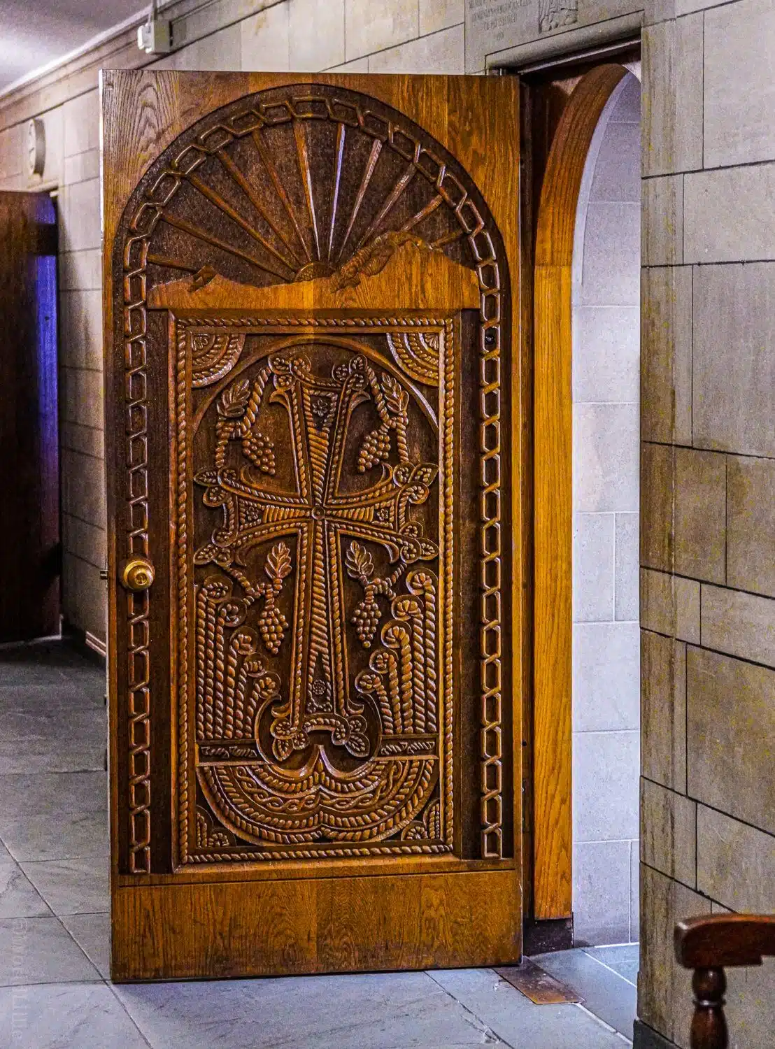 An ornate wooden door in the Armenian room.