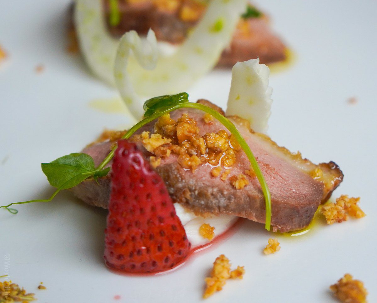 Duck breast, strawberry red wine, hazelnut duck skin crumb, and whipped chèvre.