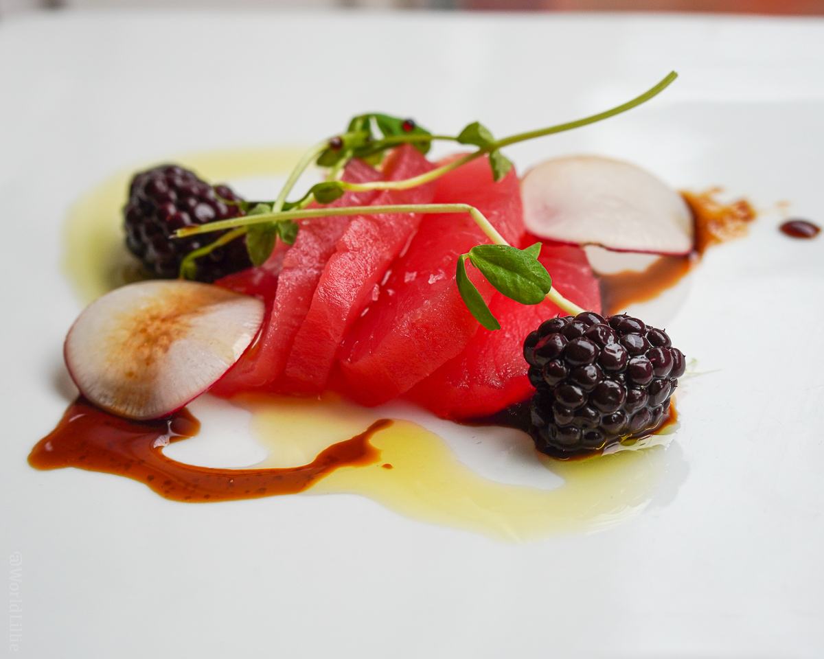 Tuna with radish, pickled blackberries, pea tendrils, and saba!