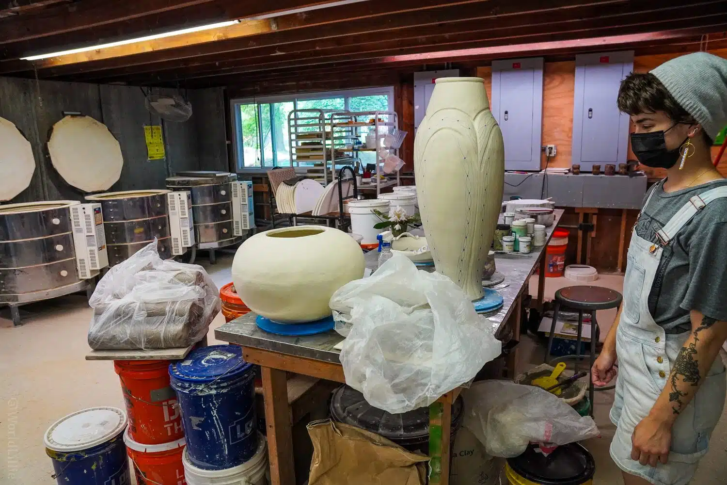 Part of the pottery studio, with kilns.