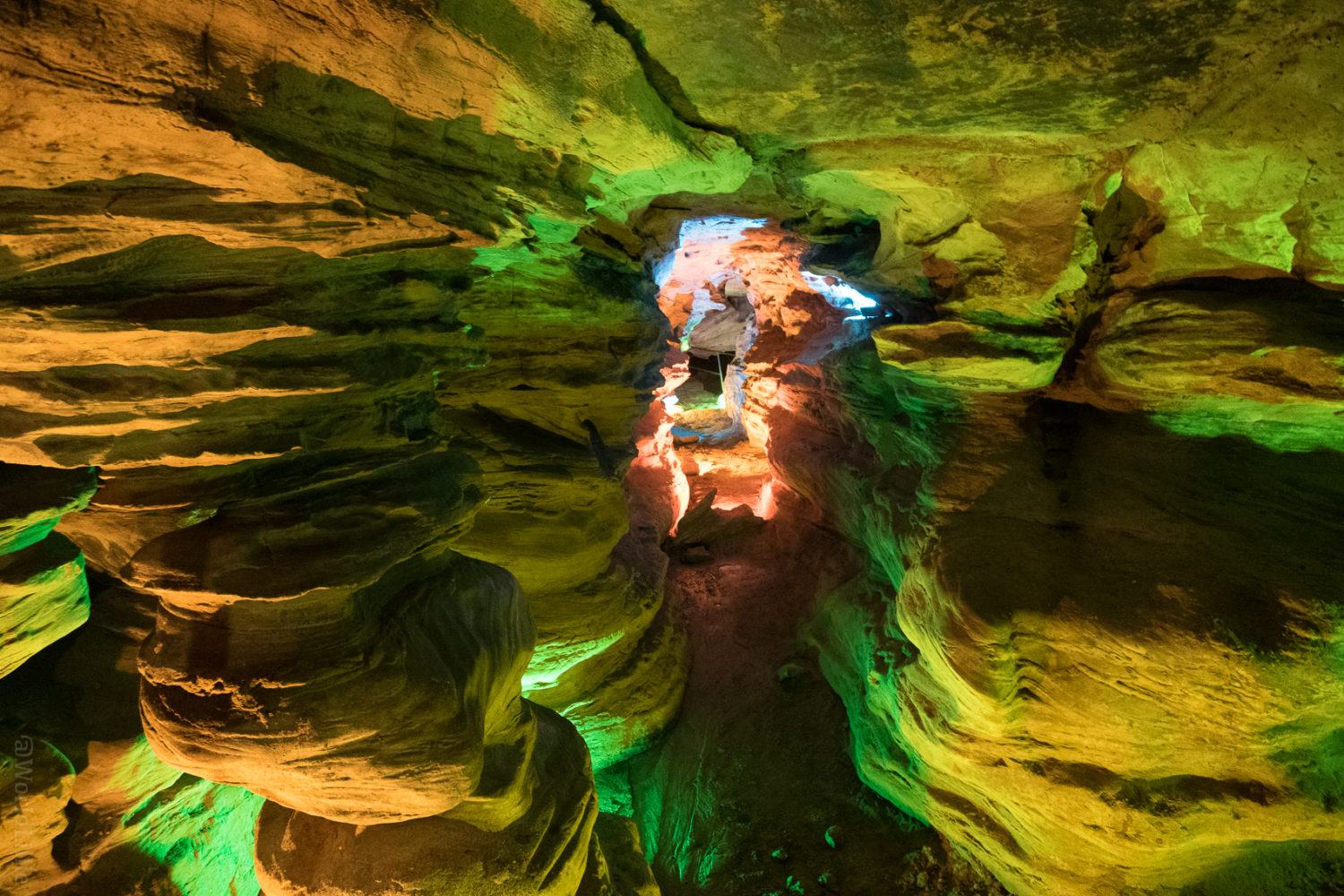 This section of the caverns is lit in green.