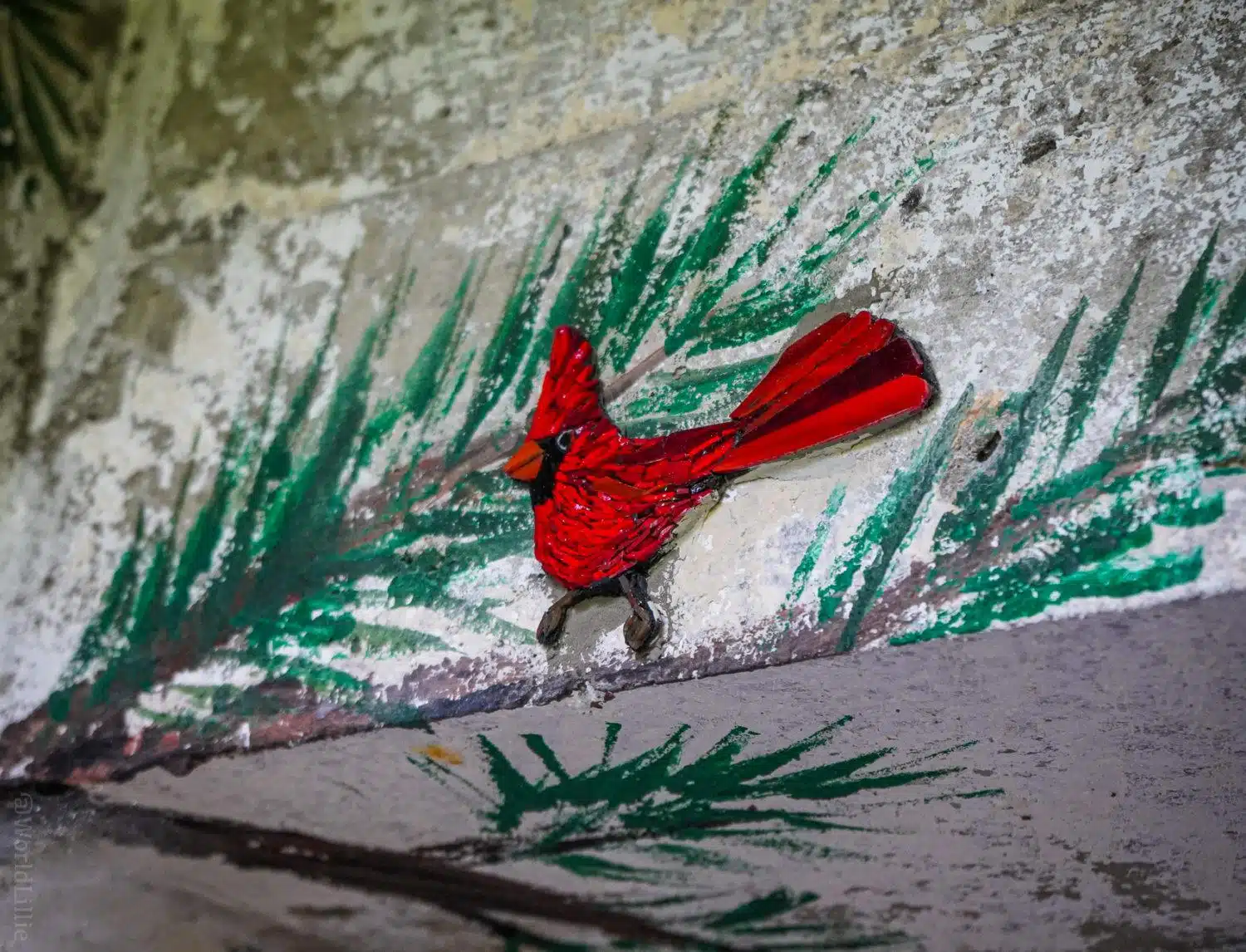 A winking mosaic cardinal.