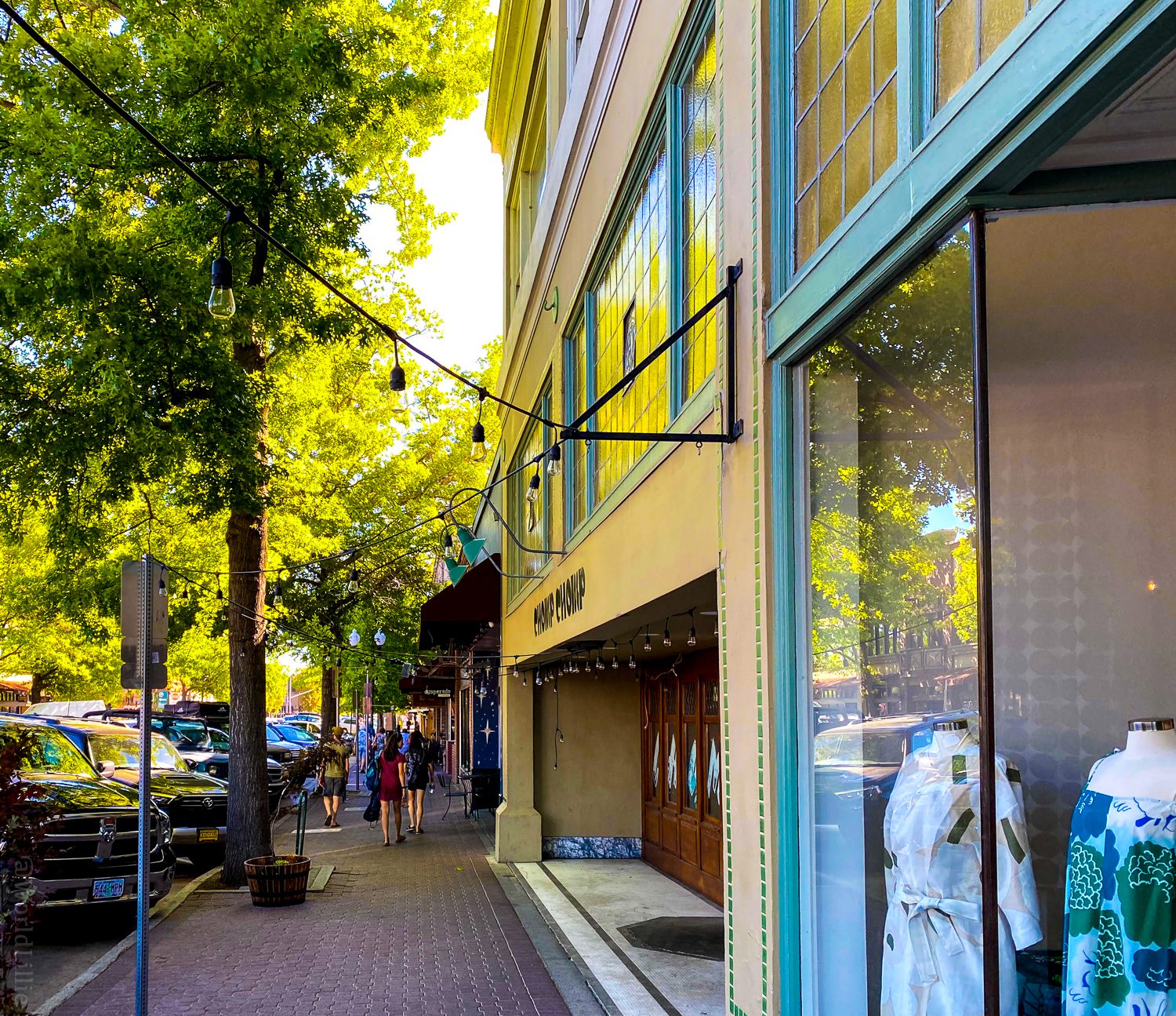 A tree-lined shopping street in Bend, Oregon.