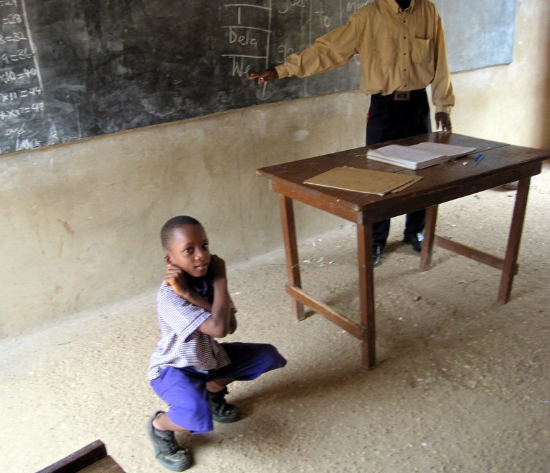 A physical punishment in school in Ghana.