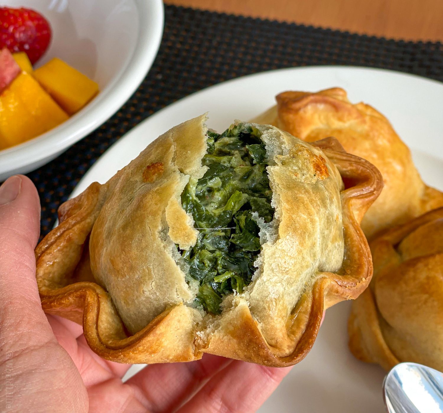 Spinach and cheese empanada.