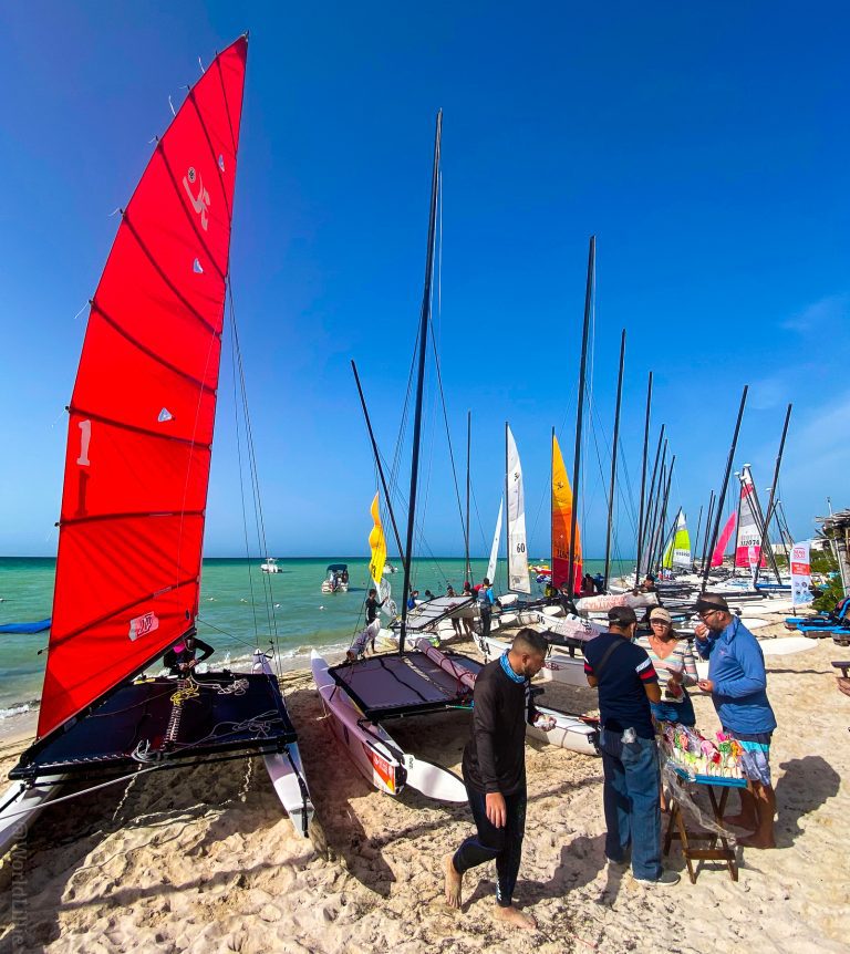 Sailboats began arriving from around the world.