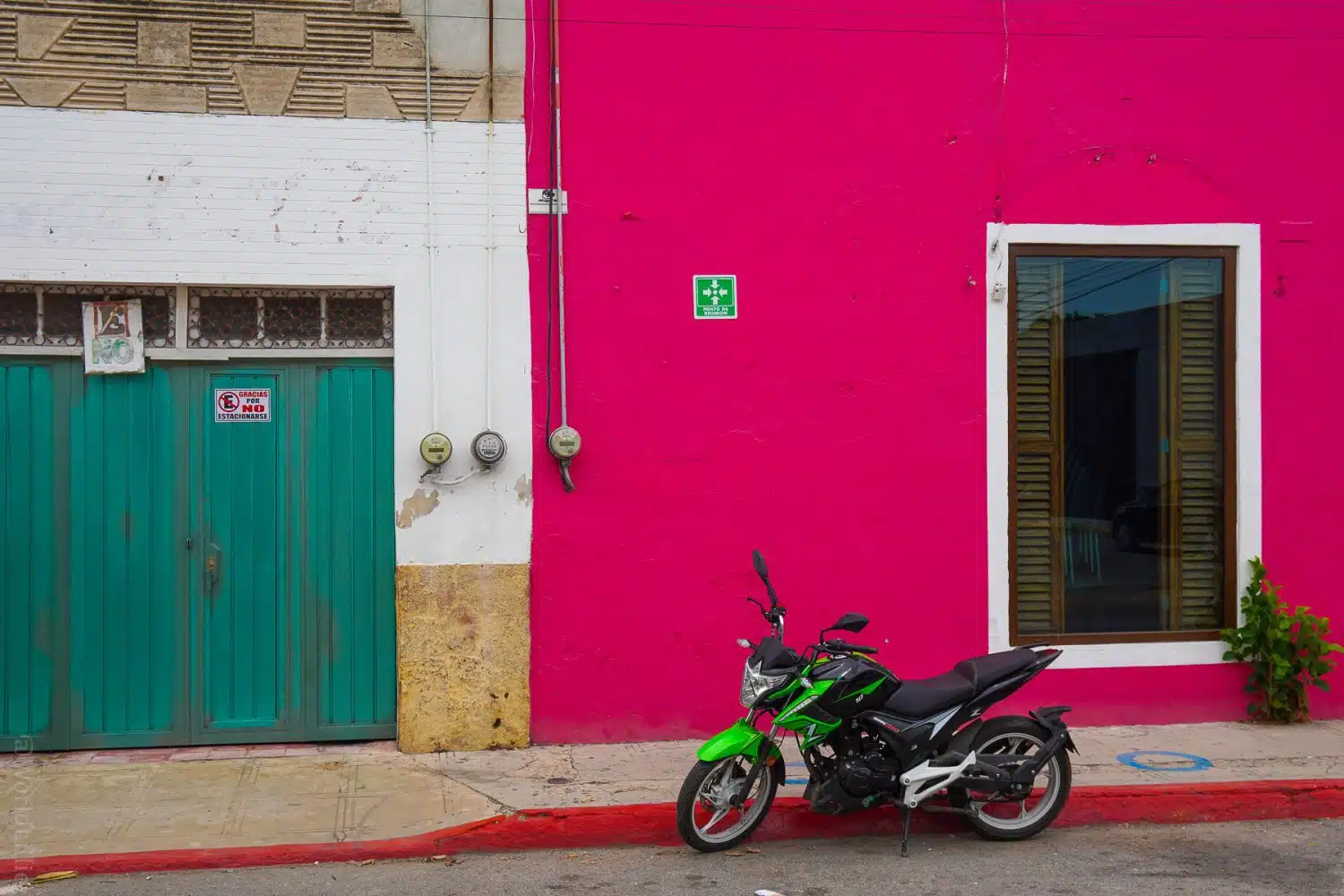 Motorcycle on magenta.