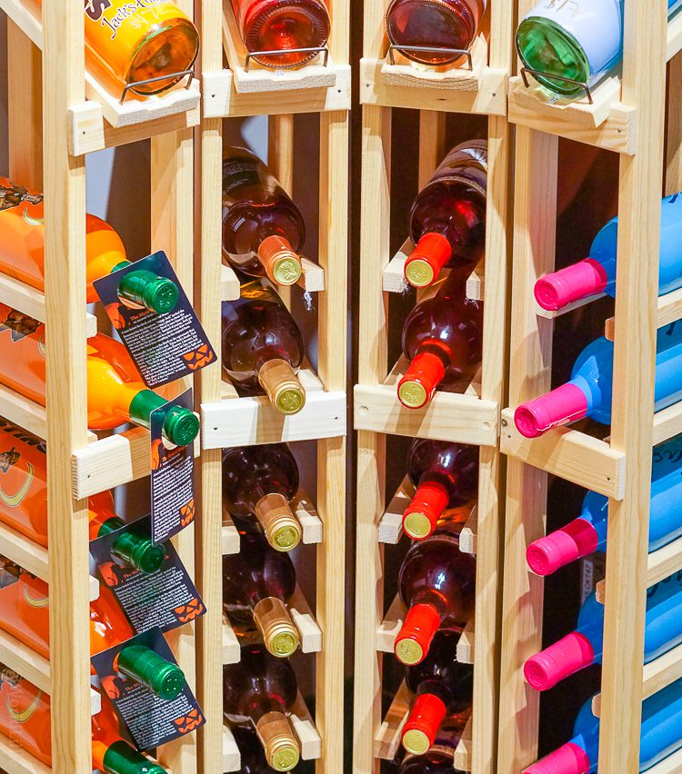 Racks of colorful wine bottles.