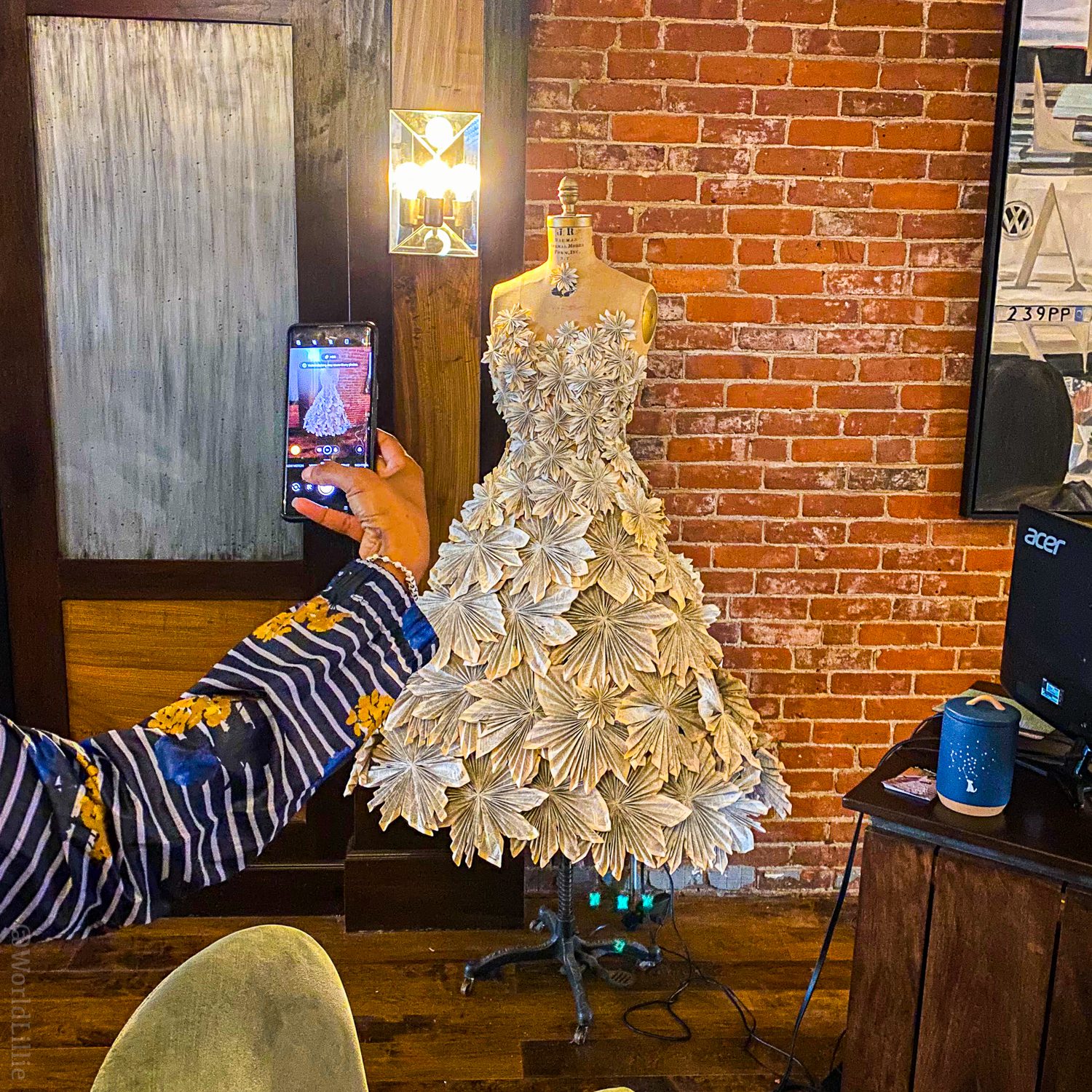 In the lobby there's a dress made out of pages from books!