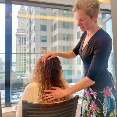 Me doing Reiki for an office wellness even in downtown Boston.