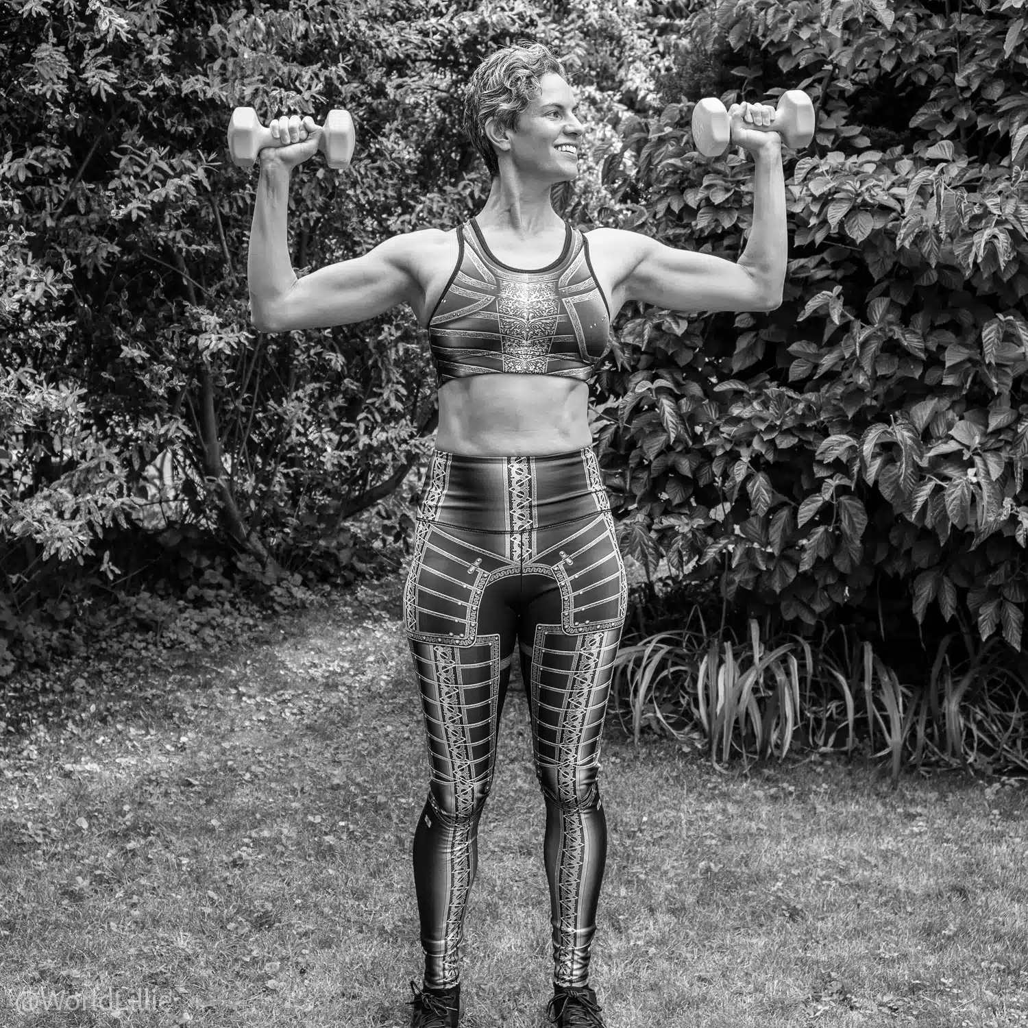 Arm and ab results from "IRON," in black and white.
