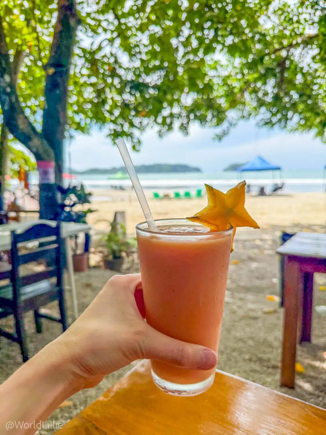 Star fruit and healthy smoothie on the beach for the win!